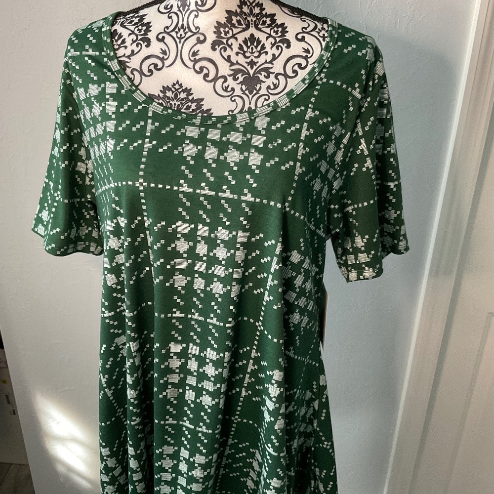 Green and white long shirt.